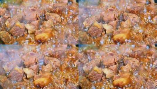 美食制作沸腾的红烧肉炖肉酱牛肉牛腩块酱汁高清在线视频素材下载