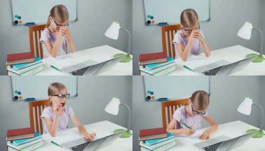 女孩在桌子上写作业高清在线视频素材下载