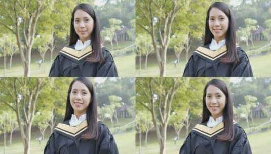 女生穿着毕业礼服微笑高清在线视频素材下载