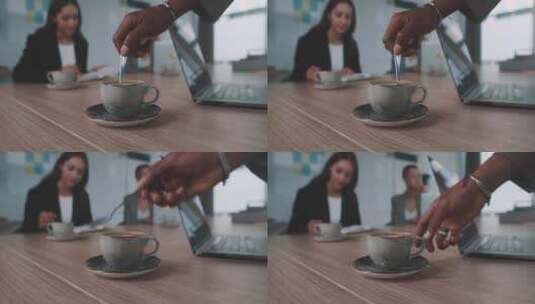 员工在办公室搅拌咖啡特写高清在线视频素材下载