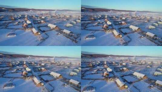 航拍大兴安岭林区冬季寂静雪村民居高清在线视频素材下载