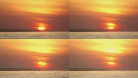 黄色的太阳从山后的海面升起高清在线视频素材下载