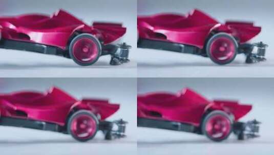 红色跑车车模 车身旋转 后轮高速旋转特写高清在线视频素材下载