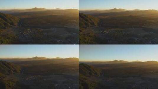 夕阳余晖中金色梦幻的银杏村火山群高清在线视频素材下载