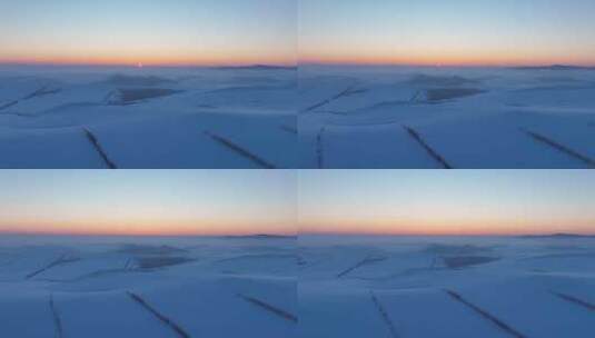 航拍内蒙古雪原雪景暮色一抹晚霞高清在线视频素材下载