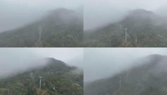 雨后森林缆车航拍雾天山林观光索道高清在线视频素材下载