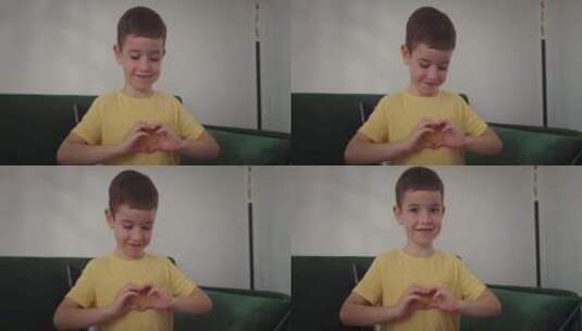 英俊的欧洲快乐的小男孩可爱的孩子脸可爱的高清在线视频素材下载