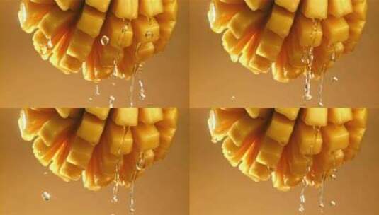 从新鲜芒果滴下的水滴在1000 Fps的高清在线视频素材下载