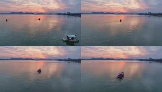 徐州市云龙湖风景区湖面夕阳下的游船高清在线视频素材下载