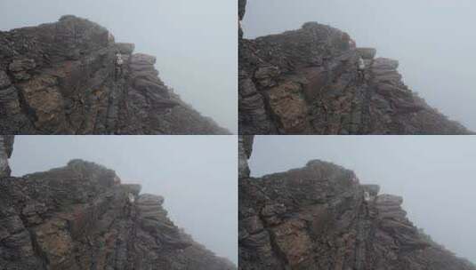 攀登四川岷山山脉雪宝顶的登山者翻越骆驼背高清在线视频素材下载