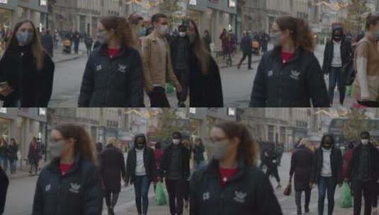 英国牛津繁忙街道上戴口罩的人高清在线视频素材下载