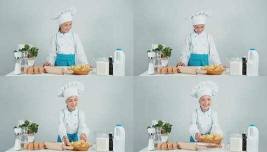 小女孩穿着厨师服准备制作美食高清在线视频素材下载
