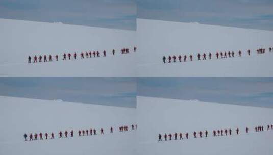 旅行团在南极洲半岛徒步旅行高清在线视频素材下载