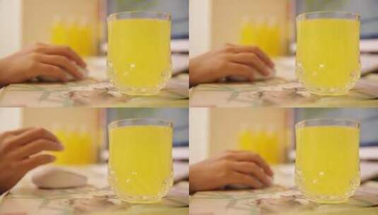 瓶装黄色菠萝果汁橙汁橘子汁办公打字高清在线视频素材下载