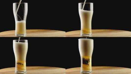 啤酒倒进桌子上的玻璃杯里_高清在线视频素材下载