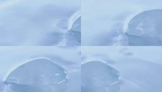 水中漂浮的冰块特写高清在线视频素材下载
