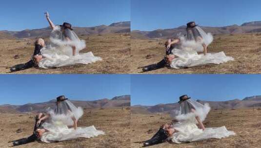 高原枯黄草原拍美女写真婚纱高清在线视频素材下载