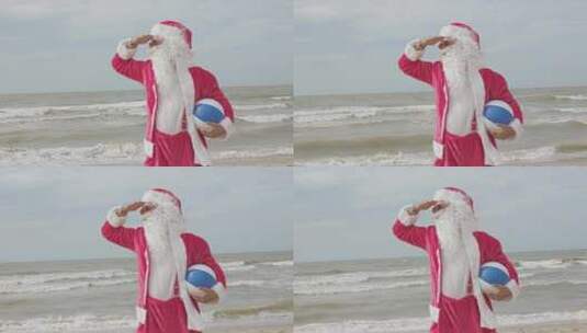 圣诞老人站在海边望着别处高清在线视频素材下载