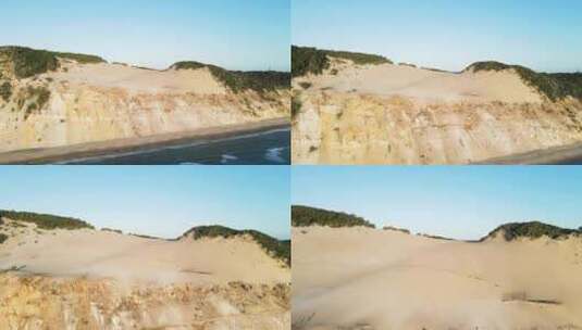 澳大利亚昆士兰彩虹海滩卡洛斯沙子不断变化的侵蚀悬崖表面高清在线视频素材下载