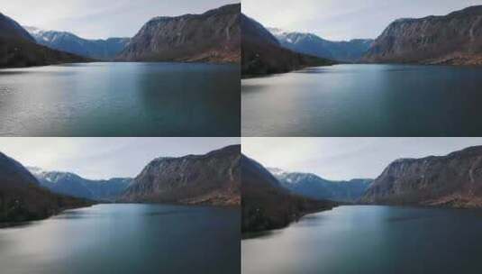 4K阿尔卑斯山一个湖泊的航拍镜头高清在线视频素材下载