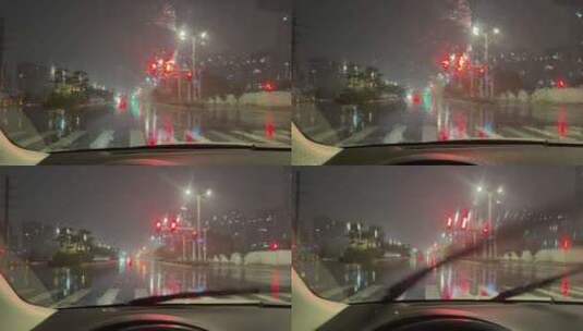 雨夜车窗雨刷道路行车红路灯高清在线视频素材下载
