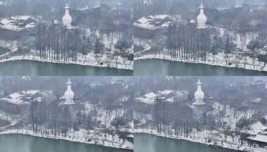 航拍瘦西湖景区园林大明寺观音山宋夹城雪景高清在线视频素材下载