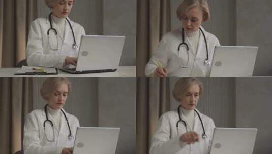 女医生在诊所办公室的笔记本电脑上查看患者高清在线视频素材下载