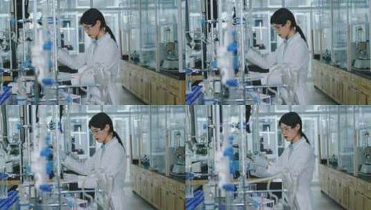 亚洲女化学家向试管中添加试剂并检查反应高清在线视频素材下载