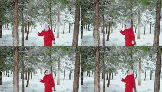冬天在公园树林里玩雪的中国女孩形象高清在线视频素材下载