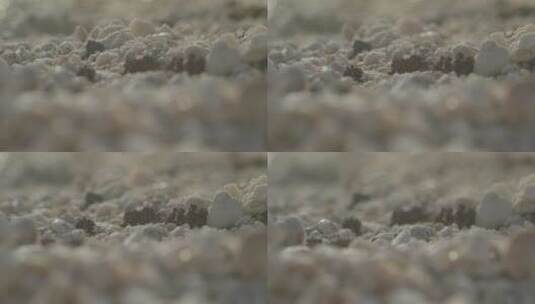 海滩上鹅卵石的极端特写高清在线视频素材下载