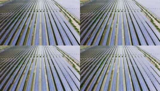 航拍农田上光伏太阳能电池板高清在线视频素材下载