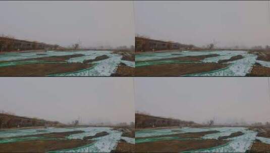 下雪中的拆迁后的荒地废墟高清在线视频素材下载