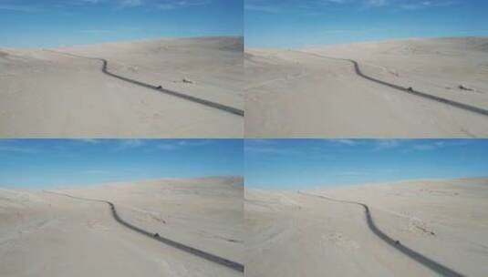 G315国道穿过青海塔里木盆地无际的戈壁沙漠高清在线视频素材下载