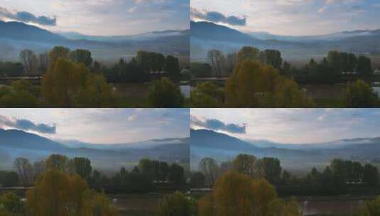 航拍秋天早晨云雾缭绕的村庄田野高清在线视频素材下载