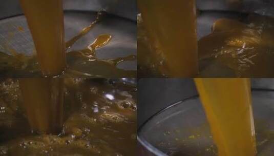 35 膏方制作 过滤药的汤汁 过滤高清在线视频素材下载