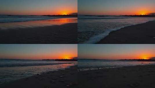 日落时海滩的低手推车照片，阳光美丽地反射在沙滩和海浪上com高清在线视频素材下载