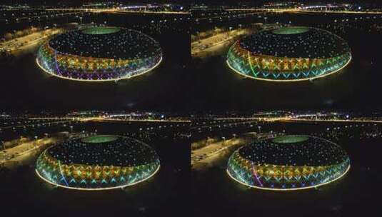 内蒙古兴安盟乌兰浩特体育馆夜景航拍高清在线视频素材下载