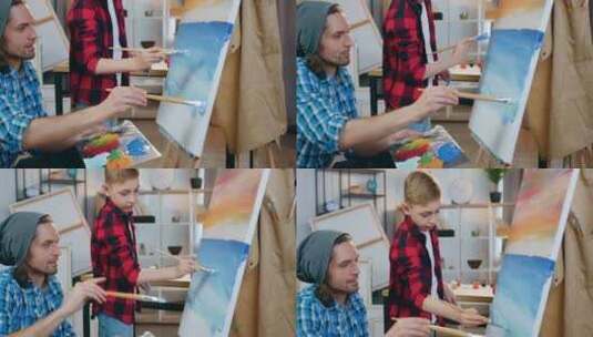 男艺术家和可爱男孩在家庭工作室架上的未来照片上画蓝色大海高清在线视频素材下载