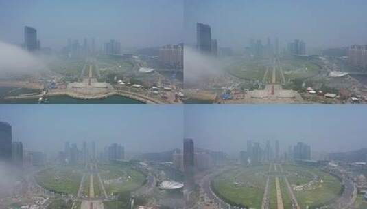 航拍大连云雾下的星海城市广场高清在线视频素材下载