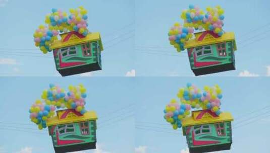 天空中悬挂着的房子和气球高清在线视频素材下载