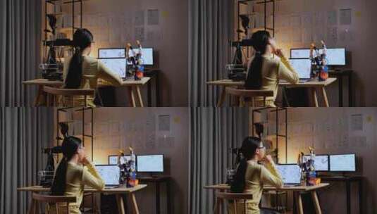 在笔记本电脑上设计电子手时具有3D打印思维的亚洲少女的后视图高清在线视频素材下载