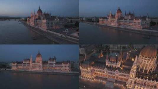 航拍匈牙利议会大楼布达佩斯多瑙河夜景灯光高清在线视频素材下载