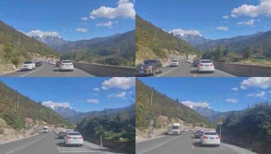 自驾游川藏线318国道折多山雪山公路风光高清在线视频素材下载