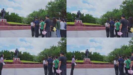 游客团体在莲花山伟人铜像宣誓高清在线视频素材下载