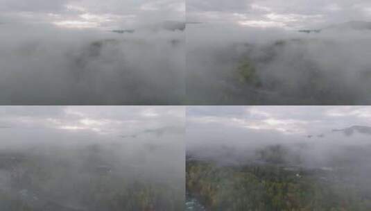 航拍新疆阿勒泰禾木村的秋雾高清在线视频素材下载