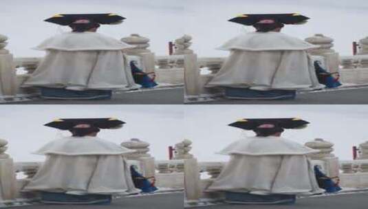 北京故宫雪中古装人像慢镜头竖屏高清在线视频素材下载