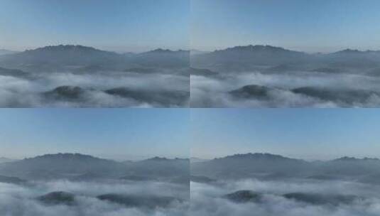 航拍晨雾迷漫的大山高清在线视频素材下载