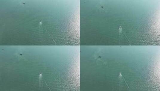 海面一只渔船行驶俯拍船只航行俯瞰渔船出海高清在线视频素材下载