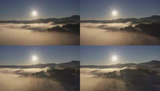 4K-逆光照耀下的云雾山脉高清在线视频素材下载