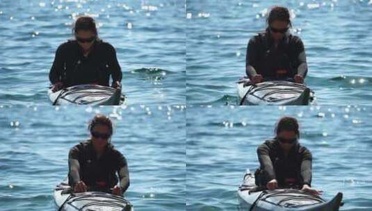 女人海上皮划艇快乐微笑的女人在海上皮划艇高清在线视频素材下载